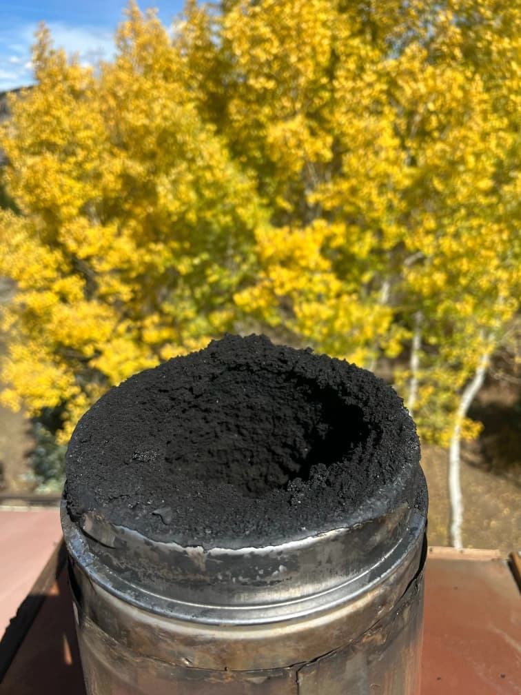 Full chimney stack with heavy creosote buildup